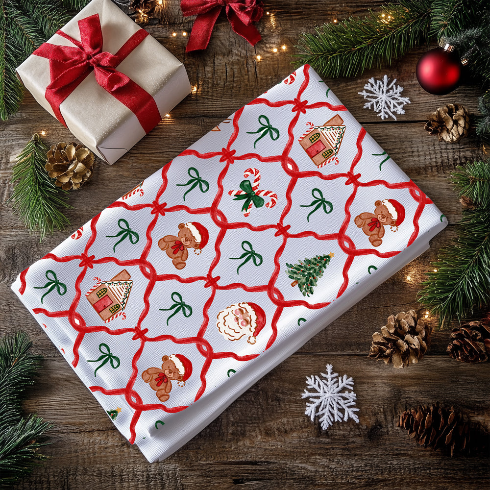 red and green christmas towel with classic holiday icons
gingerbread and santa claus holiday kitchen towel
christmas tea towel with reindeer, santa, and candy canes